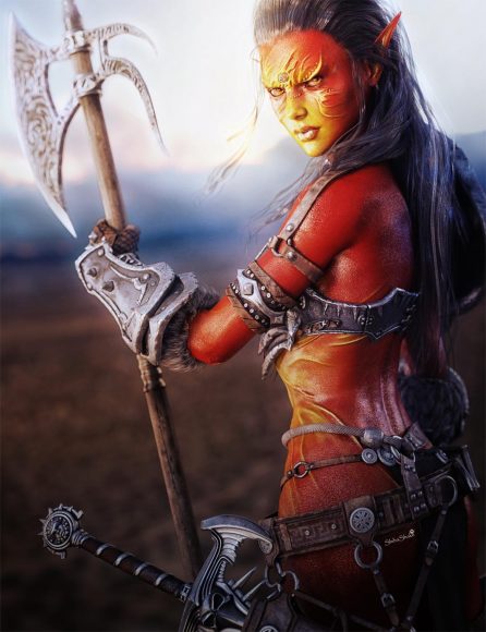 Fantasy warrior woman with dark hair, axe, and red fire elemental skin. Fantasy woman art rendered in Daz Studio Iray.